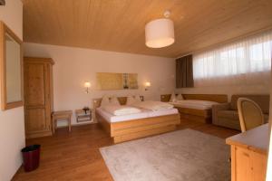 Postel nebo postele na pokoji v ubytování Hotel Munde