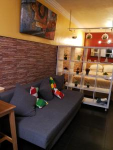 Ένα ή περισσότερα κρεβάτια σε δωμάτιο στο Central Praia Beach House
