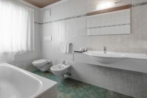 Kúpeľňa v ubytovaní Hotel Conturines