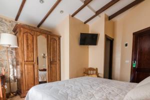 Posteľ alebo postele v izbe v ubytovaní Casa Banys L'Avellà