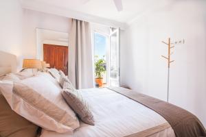 Postel nebo postele na pokoji v ubytování Rooms & Suites Terrace 4C