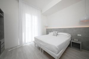 Letto o letti in una camera di Hotel Gambrinus Mare