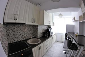 Køkken eller tekøkken på Apartament Centru Istoric Radu + 20 billeder