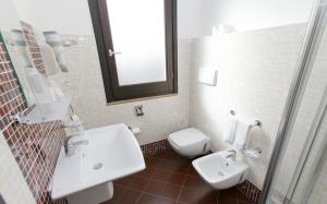 Een badkamer bij Hotel Al Ritrovo
