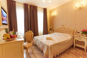 Postel nebo postele na pokoji v ubytování New Reiter Hotel