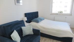 Posteľ alebo postele v izbe v ubytovaní BTS Apartaments - Apartamenty Blisko Morza