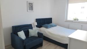 Posteľ alebo postele v izbe v ubytovaní BTS Apartaments - Apartamenty Blisko Morza