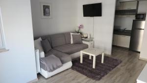 Kuchyňa alebo kuchynka v ubytovaní BTS Apartaments - Apartamenty Blisko Morza