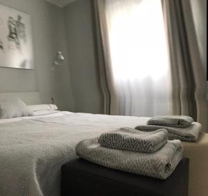 A bed or beds in a room at Casa del Vado