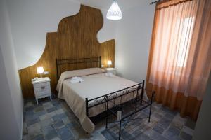 Postel nebo postele na pokoji v ubytování Coraje Room & Breakfast