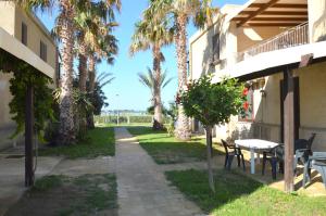 A garden outside Resort Santa Maria Hotel