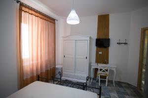 Postel nebo postele na pokoji v ubytování Coraje Room & Breakfast