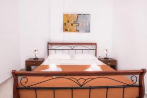 Letto o letti in una camera di Demi Studios