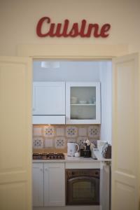 A kitchen or kitchenette at Nuvole Barocche