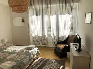 Posteľ alebo postele v izbe v ubytovaní Miky Home