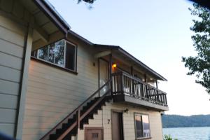 a house with a balcony on the side of it at Overlooking clearlake from the living room in Clearlake