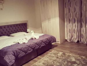 Postel nebo postele na pokoji v ubytování Hotel Livia
