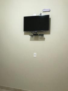 TV a/nebo společenská místnost v ubytování Pousada Pouso Vitoria