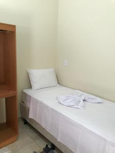 Postel nebo postele na pokoji v ubytování Pousada Pouso Vitoria