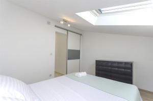 Postel nebo postele na pokoji v ubytování Apartment Srima