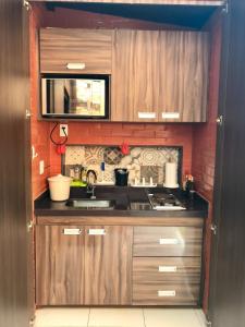 Kuchyň nebo kuchyňský kout v ubytování Flat no Portogalo