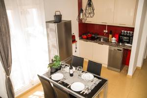 Kuchyň nebo kuchyňský kout v ubytování Fantastic Apartment Marilyn Orlando 85