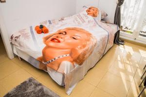 Postel nebo postele na pokoji v ubytování Fantastic Apartment Marilyn Orlando 85
