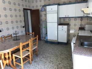 Kuchyň nebo kuchyňský kout v ubytování Hogar Pepa