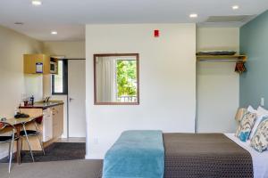 Säng eller sängar i ett rum på Nautilus Lodge Motel