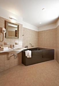 Koupelna v ubytování Boutique Hotel Justus