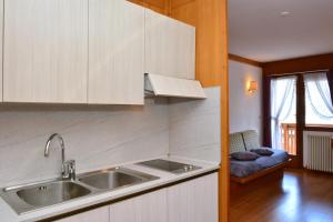 Kuchyňa alebo kuchynka v ubytovaní Ski Residence + 37 fotografií