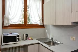 Kuchyňa alebo kuchynka v ubytovaní Ski Residence