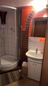 Koupelna v ubytování Apartament na Wrzosach + 26 fotografií