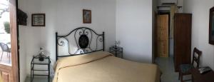 Cama ou camas em um quarto em Hotel Villaggio Stromboli - isola di Stromboli