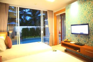 TV/Unterhaltungsangebot in der Unterkunft Apsara Beachfront Resort & Villa - SHA Extra Plus