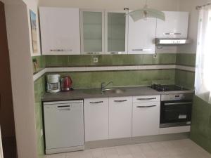 Kuchyň nebo kuchyňský kout v ubytování Apartment Vrba