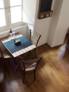 TV a/nebo společenská místnost v ubytování Boutique Hotel Albero Nascosto