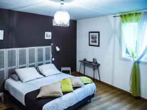 Llit o llits en una habitació de Hôtel U Passa Tempu