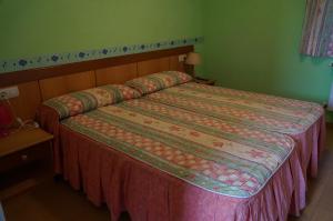Posteľ alebo postele v izbe v ubytovaní Hostal Camino Real