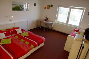 Postel nebo postele na pokoji v ubytování Hostel Humpolec