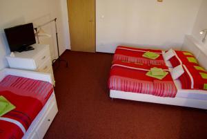 Postel nebo postele na pokoji v ubytování Hostel Humpolec