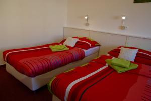 Postel nebo postele na pokoji v ubytování Hostel Humpolec