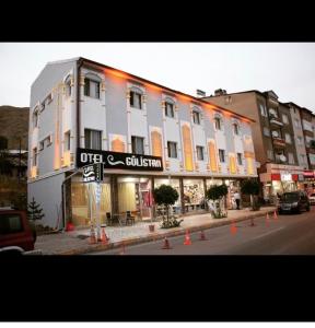 a building on a street with cones in front of it at Gulistan Hotel in Zara