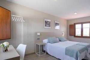Postel nebo postele na pokoji v ubytování Casa O Real + 22 fotografií