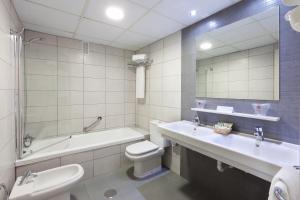 Ванная комната в Tigotan Lovers & Friends Playa de las Americas - Adults Only (+18)