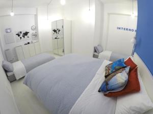 A bed or beds in a room at Interno5 Apartment