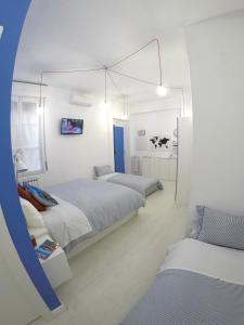 Ліжко або ліжка в номері Interno5 Apartment