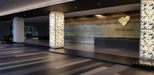 a lobby of a building with a sign on the wall at Eclipse Residence Pangea in Cyberjaya +30 photos