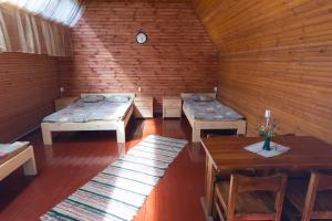 Postel nebo postele na pokoji v ubytování Kauksi Campsite