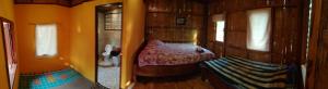 Postel nebo postele na pokoji v ubytování Pencave Homestay